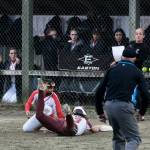 Ketchikan sophomore Mylee Gray is tagged out by Juneau-Douglas High School: Yadaa.at Kalé sophomore third baseman Milina Mazon during the Lady Kings and Crimson Bears tie on Thursday at Melvin Park. (Klas Stolpe / Juneau Empire)