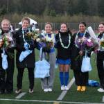 TMHS senior soccer players pose before their match on Friday. From left: Kylie Morris, Kaelin Tibbles, Mackenzie Olver, Brooke McAndrews, Ana Scopel, Mercedes Cordero, Lillian Palmer-Stears and Samantha Mead. (Klas Stolpe / Juneau Empire)