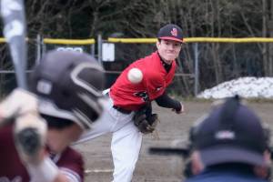 Juneau-Douglas High School: Yadaa.at Kalé senior pitcher Eli Crupi delivers against Ketchikans Colby Hanchey during the Crimson Bears 5-4 win over the visiting Kings on Friday at Adair Kennedy Field. (Klas Stolpe / Juneau Empire)