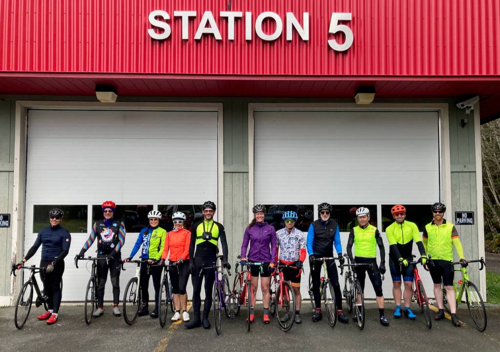 Entrants in the Tee Harbor Road Race pose for a photo before Saturdays 20-mile event. (Klas Stolpe / Juneau Empire)