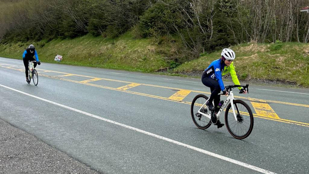 Janice Sheufelt outsprints Rob Welton to the finish of the Tee Harbor Road Race on Saturday. (Courtesy Photo / Juneau Freewheelers)