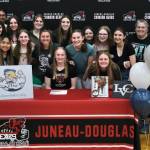 Juneau-Douglas High School: Yadaa.at Kalé senior Anna Dale, shown with family and friends, signed a letter of intent Monday to play hockey for Lebanon Valley College in Annville, Pennsylvania. (Klas Stolpe / Juneau Empire)
