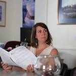 City and Borough of Juneau Assembly member Christine Woll holds the agenda for the Assembly City Manager Recruitment Committee Monday afternoon. (Clarise Larson / Juneau Empire)