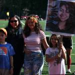 JDHS senior Angelica Rodriguez and family members during the Crimson Bears girls soccer senior recognition at the Adair-Kennedy pitch Tuesday. (Klas Stolpe / Juneau Empire)