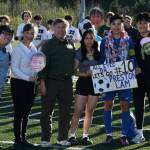 Thunder Mountain senior Preston Lam with family during the Falcons boys soccer senior recognition Tuesday at Falcons Field. (Klas Stolpe / Juneau Empire)