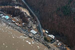 In this aerial photo chunks of ice follow flooding from an ice jam in Crooked Creek, Alaska, May 15, 2023. Ice jams along two Alaska rivers unleashed major flooding over the weekend. (Jennifer Wallace / Alaska Division of Homeland Security and Emergency Management)