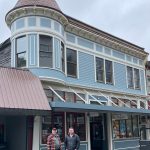 Neil MacKinnon and Jared Cure stand outside Juneaus most recognizable historic building in April 2023. MacKinnons great-grandparents built the Alaska Steam Laundry in 1901. After several generations, MacKinnon sold the building to well-known local entrepreneur Jared Cure two months before COVID. (Laurie Craig / For the Downtown Business Association)