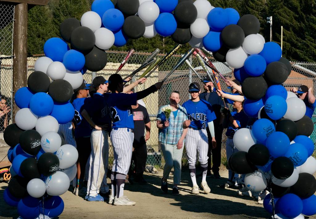 Thunder Mountain Falcons senior Carson Cummins and family were celebrated Wednesday at Adair-Kennedy Field. (Klas Stolpe / Juneau Empire)