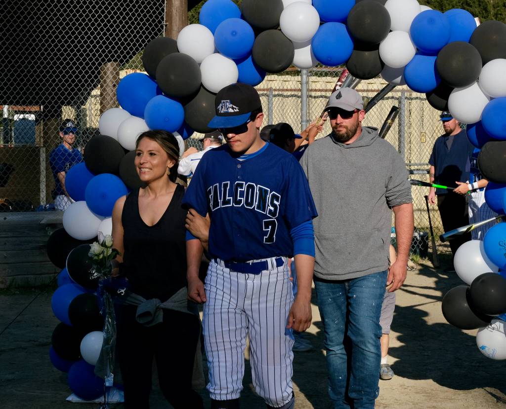 Thunder Mountain Falcons senior Nic Daniels and family were celebrated Wednesday at Adair-Kennedy Field. (Klas Stolpe / Juneau Empire)