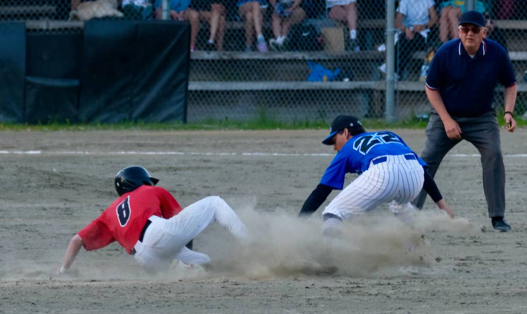 Juneau-Douglas High School: Yadaa.at Kalé Crimson Bears baserunner Eli Crupi (8) slides safely into second base in a cloud of dust as Thunder Mountain Falcons second baseman Madden Mendoza applies a tag Wednesday at Adair-Kennedy Field. (Klas Stolpe / Juneau Empire)