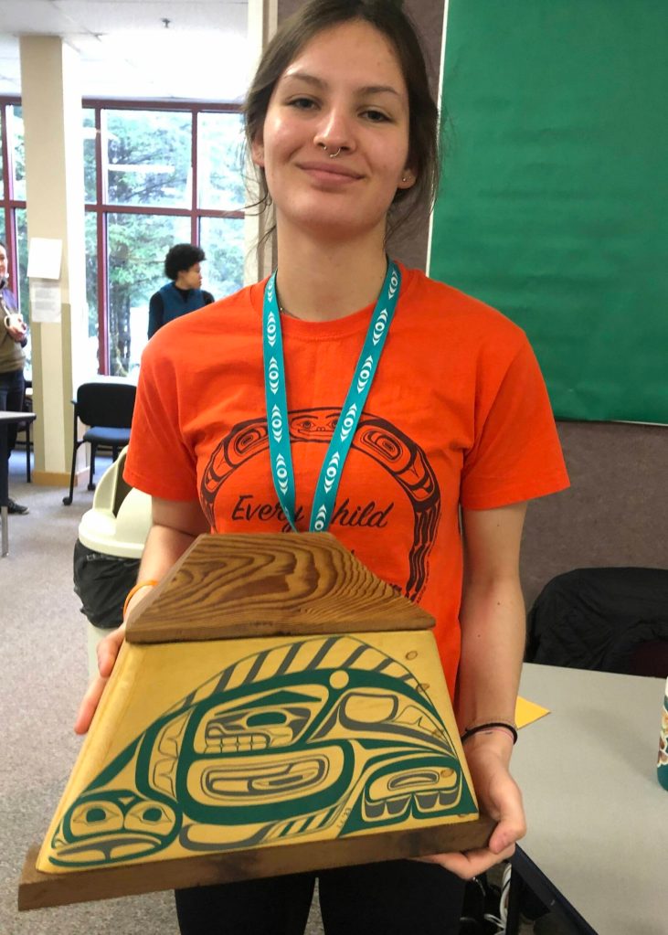 Laci Lowery from Craig holds her prize winning formline box for which she received the Kirk Garbisch Award for Creative Excellence at this years Alaska Student Activities Associations Region V Art Fest in Yakutat. She took the same award last year in Klawock for a woodcarved formline beaver bowl. (Courtesy Photo / Heather Ridgway)
