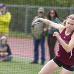 Julia Biagi, a Kayhi junior, gets ready to send a discus on an over 80-foot trip Saturday. Biagi took first place in discus for Division I girls with a distance of 84 feet and 10.5 inches. (Ben Hohenstatt / Juneau Empire)