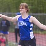Amelia Lockwood, a Thunder Mountain sophomore, grits her teeth before sending a discus sailing. Lockwood placed second in Division I girls discus with a distance of 61 feet and 3 inches at the Region V Track & Field Championships held Friday and Saturday at TMHS. (Ben Hohenstatt / Juneau Empire)
