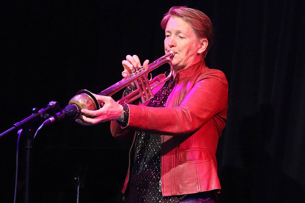 Yngvil Vatn Guttu, co-creater of Amplify Alaska, plays trumpet during her organizations fundraising event Saturday night at Crystal Saloon for the Áakw Rock Indigenous Music Festival. (Mark Sabbatini / Juneau Empire)