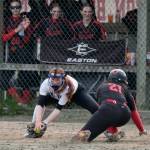 Thunder Mountain junior third baseman Jack Lovejoy attempts to tag Juneau-Douglas senior base runner Amira Andrews during softball action Saturday at Melvin Park. Andrews was out on the play. (Klas Stolpe / Juneau Empire)