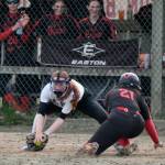 Thunder Mountain junior third baseman Jack Lovejoy attempts to tag Juneau-Douglas senior base runner Amira Andrews during softball action Saturday at Melvin Park. Andrews was out on the play. (Klas Stolpe / Juneau Empire)