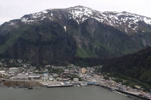 Mountains tower over downtown Juneau Wednesday morning. On Tuesday night the City and Borough of Juneaus Planning Commission unanimously passed a motion to not recommend the adoption of new hazard maps and policy based on them to the Assembly. (Clarise Larson / Juneau Empire)