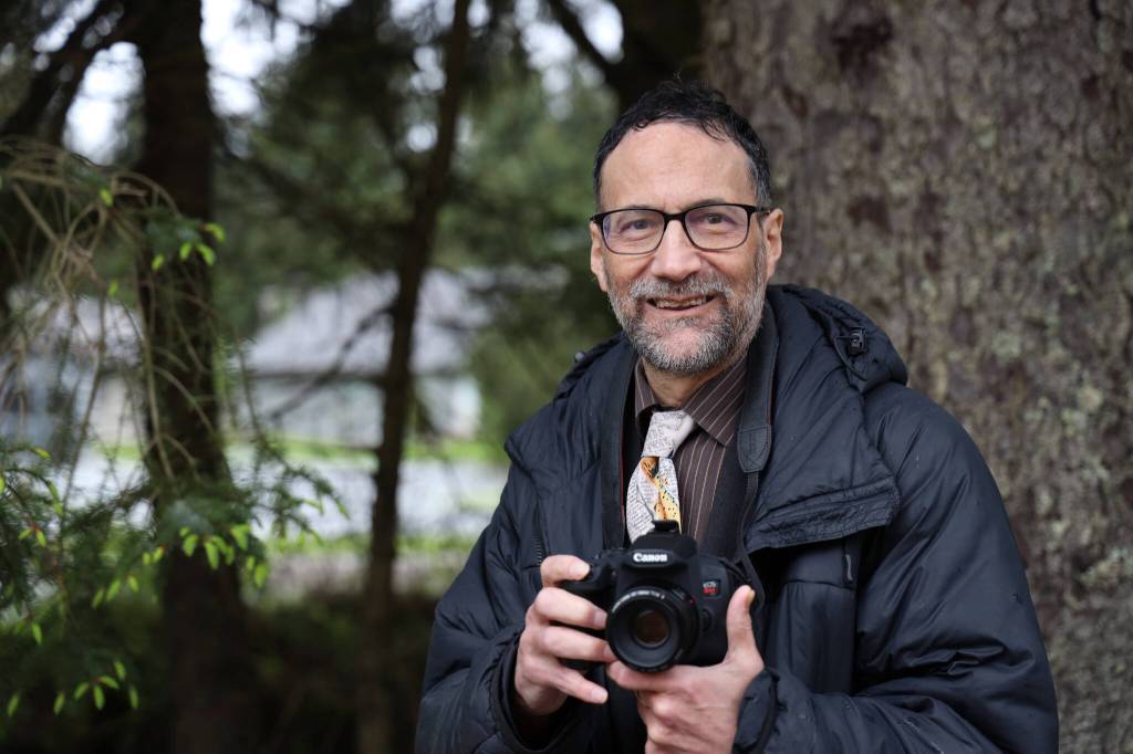 Juneau Empire reporter Mark Sabbatini smiles for a photo while reporting in May. Sabbatini is the Empires new managing editor as of Monday. (Clarise Larson / Juneau Empire)