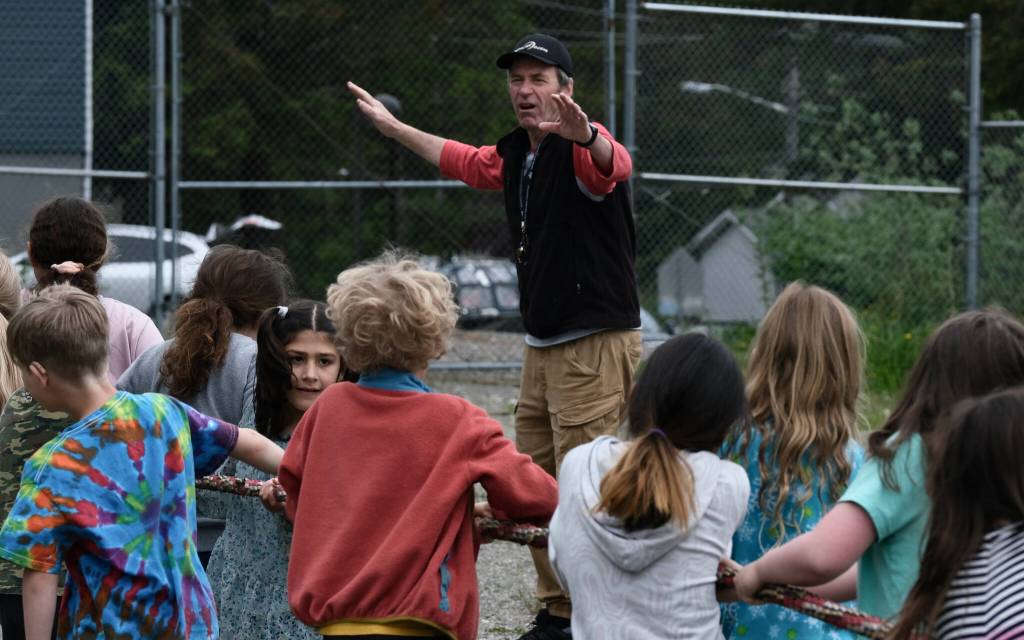 Sayéik: Gastineau Community School physical education teacher Dirk Miller starts a game of tug of war during their Field Day on Thursday. Miller is retiring after 24 years at the school. (Klas Stolpe / Juneau Empire)