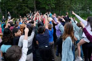 Sayéik: Gastineau Community School students defeat physical education teacher Dirk Miller in Rock, Paper, Scissors during their Field Day on Thursday. Miller is retiring after 24 years at the school. (Klas Stolpe / Juneau Empire)