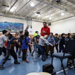 Students from the Tlingit culture, language and literacy program at Harborview Elementary School dance in front of elders during the programs in early February. (Clarise Larson / Juneau Empire File)