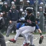 Juneau-Douglas base runner Brandon Casperson gets safely back to first base before Thunder Mountain first baseman Rory Hayes applies the tag during the Crimson Bears 11-6 win over the Falcons to open the Region V Tournament, Thursday, at Adair Kennedy Field. (Klas Stolpe / Juneau Empire)