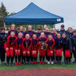 The JDHS Crimson Bears pose with their Region V Championship on Saturday at Sitkas Moller Field. (Courtesy Photo)