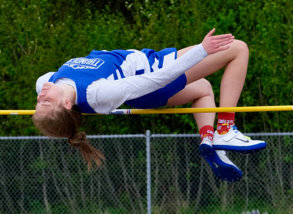 Thunder Mountain senior Mallory Welling wins the girls DI high jump during the Region V Track & Field Championships, Friday, May 19, at Thunder Mountain. Welling tied for second place in the DI girls high jump on Friday with South Anchorage freshman Rachael White, both cleared 4-10.00, behind Soldotna senior Katelyn Morrison at 5-00. (Klas Stolpe / Juneau Empire)