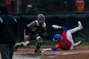 Photos by Klas Stolpe / Juneau Empire
Sitka junior Grady Smith slides safely into home plate during the Wolves 13-7 win over the Ketchikan Kings for the Region V Baseball Championship on Saturday at Adair Kennedy Field.