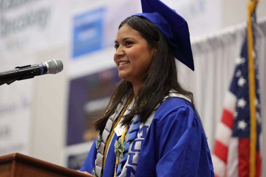 Mercedes Cordero delivers remarks to the crowd gathered at the Thunder Mountain High School 2023 graduation ceremony Sunday afternoon. (Clarise Larson / Juneau Empire)