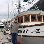 Longtime Juneau resident Joe Emerson, co-owner of the F/V Tommy L II berthed in Aurora Harbor, smiles for a photo next to his boat in late May. Emerson is one of the hundreds of trollers in Southeast Alaska that will be directly impacted by a federal court order that may force the closure of the regions king salmon troll fishery set to begin July 1. (Clarise Larson / Juneau Empire)