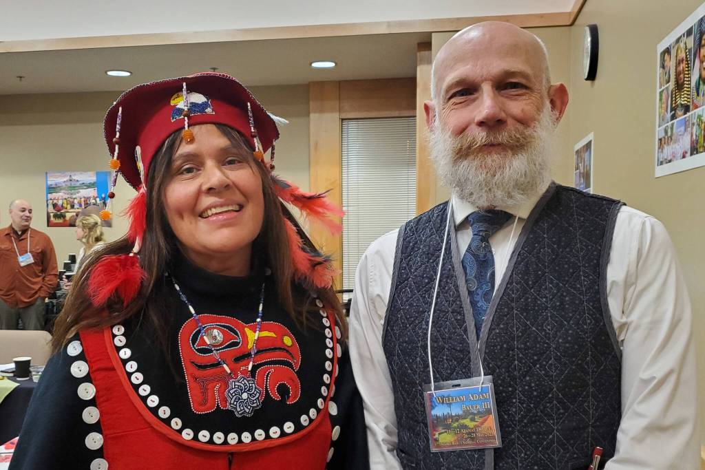 Jacque Tagaban (left) and Adam Bauer (right) smile for a photo at the Alaska Baháí National Convention in late May. (Courtesy Photo / Adam Bauer)