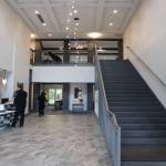 The entrance lobby of the Riverview Senior Living complex leads to a variety of in-house facilities including dining and recreation areas. (Clarise Larson / Juneau Empire)