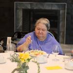 Wanda Fleming, a Juneau resident since 1973, eats dinner Wednesday with other new residents at the Riverview Senior Living complex. Fleming said she has been following the facilitys progress since she first read about it in 2021 and was among the first four residents to move in. (Mark Sabbatini / Juneau Empire)