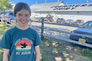 Hazel Sutton, 13, pauses at Creamers Field Migratory Waterfowl Refuge at the end of her shift monitoring tree swallow nest-boxes. (Courtesy Photo / Ned Rozell)