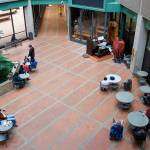 An audience of state workers, other Juneau residents and visitors listens to a concert by J. Allan MacKinnon on the 1928 Kimball Theatre Pipe Organ in the Alaska State Office Building on Friday. The concerts were a mainstay in the building for decades until the COVID-19 pandemic halted them for more than three years. The first show since the disruption took place with little advance public notice. (Mark Sabbatini / Juneau Empire)