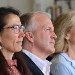 From left to right, U.S. Rep. Mary Peltola, D-Alaska, U.S. Sen. Dan Sullivan, R-Alaska, and U.S. Sen. Lisa Murkowski, R-Alaska, sit side by side during a U.S. Coast Guard event in Juneau on Friday. (Clarise Larson / Juneau Empire)