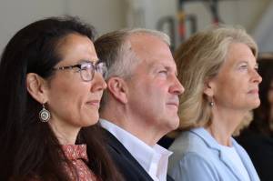 From left to right, U.S. Rep. Mary Peltola, D-Alaska, U.S. Sen. Dan Sullivan, R-Alaska, and U.S. Sen. Lisa Murkowski, R-Alaska, sit side by side during a U.S. Coast Guard event in Juneau on Friday. (Clarise Larson / Juneau Empire)