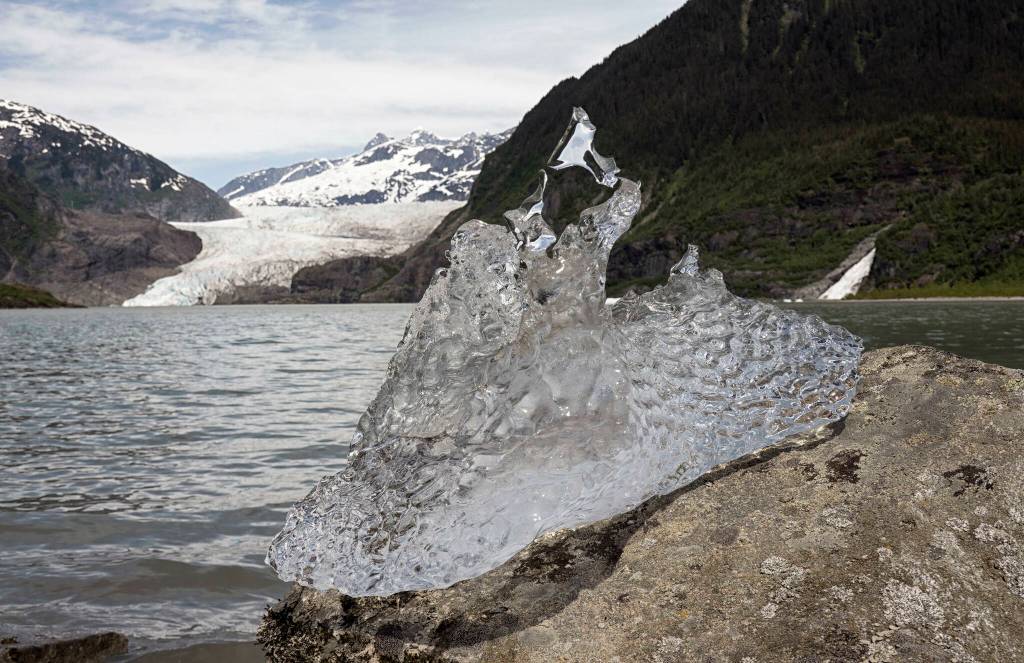 Glacial ice on the rocks at Mendenhall Lake on June 7. (Courtesy Photo / Kenneth Gill, gillfoto)