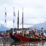 Clarise Larson / Juneau Empire
Crew members of the <strong>Moananuiākea</strong> voyage from the <strong>Hōkūlea</strong> canoe paddle to the shore of Auke Bay as they are welcomed Saturday afternoon by Juneau residents and tribal leaders.