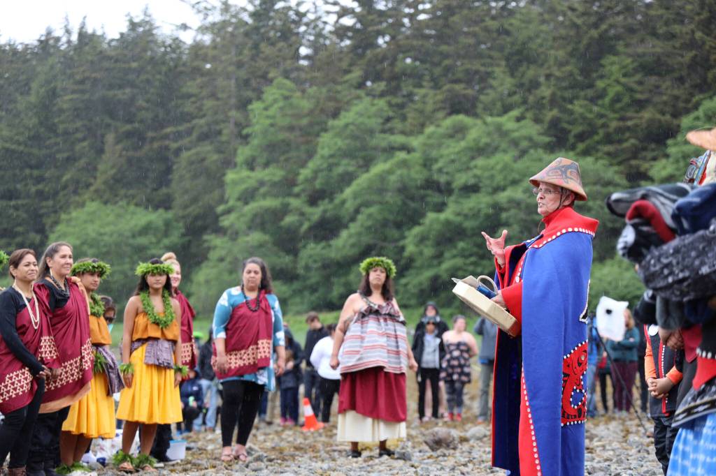 Clarise Larson / Juneau Empire
Fran Houston, cultural Leader of the Aakw Kwáan, speaks to the crew members of the <strong>Moananuiākea</strong> voyage from the<strong> </strong><strong>Hōkūlea</strong> after they arrived on the shore of Auke Bay on Saturday afternoon for a welcoming ceremony.