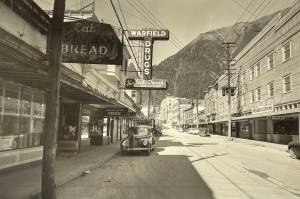 South Franklin Street with the three-story Senate Apartments on the right, circa 1945. In the 1980s, Bruce Denton and the late Larry Spencer purchased the apartments, and gutted the building to remake it into retail and office space, renaming it the Senate Mall. (Photo credit Alaska State Library Historical Collections, Juneau Area Views, Franklin St. 01-2831)