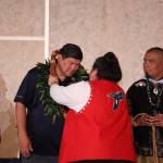 Capt. Mark Ellis receives a ceremonial cedar rope alongside other captains during a blessing ceremony at the global launch ceremony of the Moananuiākea voyage at the University of Alaska Recreation Center Thursday afternoon. (Clarise Larson / Juneau Empire)