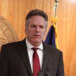 Gov. Mike Dunleavy speaks during a news conference in April focusing on the budget and a long-range fiscal plan for the state. He signed the budget for the fiscal year starting July 1 on Sunday, but did not publicly announce the signing or line-item vetoes made  including cutting in half an increase to public education spending  until Monday. (Clarise Larson / Juneau Empire File)