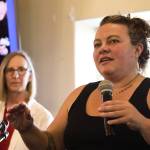 Mandy Cole, executive director of AWARE, speaks to the crowd at the Greater Juneau Chamber of Commerce Thursday afternoon at the Moose Lodge alongside Amy Skilbred, executive director of the Juneau Community Foundation. (Clarise Larson / Juneau Empire)