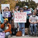 Activists demonstrate as the Supreme Court hears oral arguments on a pair of cases that could decide the future of affirmative action in college admissions, in Washington, Oct. 31, 2022. The Supreme Court ruled Thursday that colleges and universities must stop considering race in admissions, forcing institutions of higher education to look for new ways to achieve diverse student bodies. In a 6-3 decision, the court struck down admissions plans at Harvard and the University of North Carolina, the nations oldest private and public colleges, respectively. (AP Photo/J. Scott Applewhite, File)