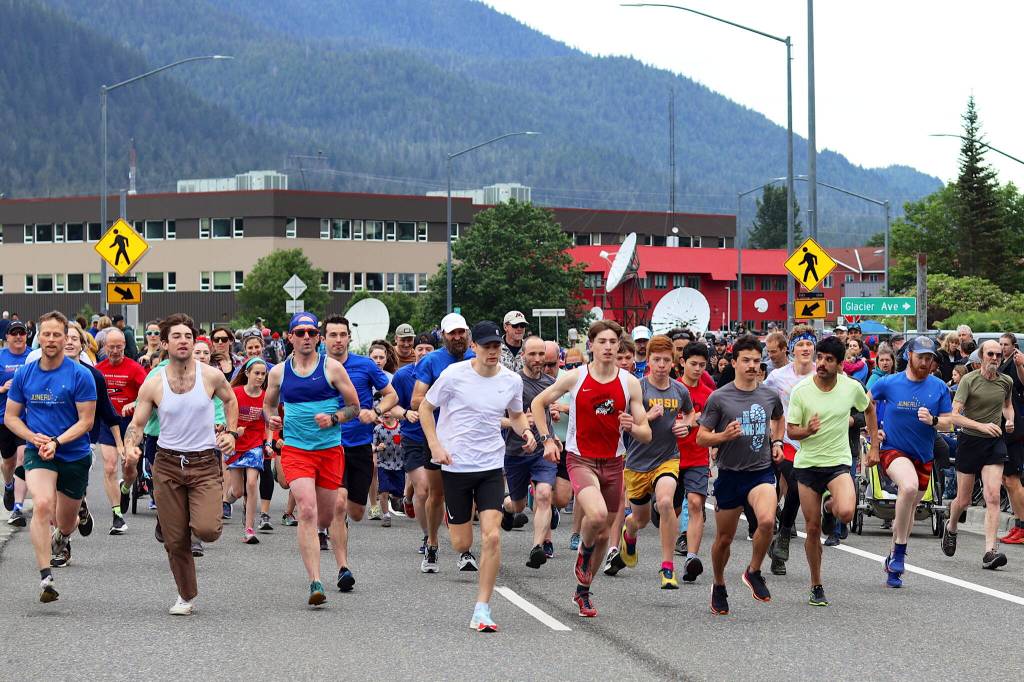 Runners start the 10th Annual Glenn Frick Memorial Run on Egan Drive about 30 minutes before the annual Fourth of July parade proceeds down the same street on Tuesday. (Mark Sabbatini / Juneau Empire)