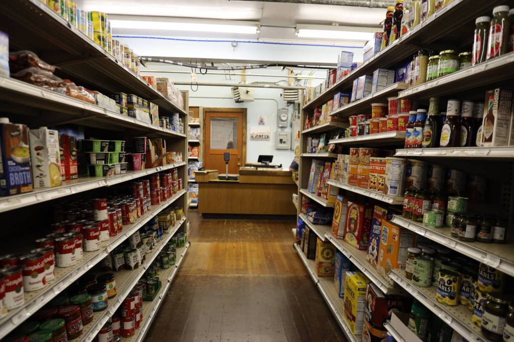 Cans of soup and condiments fill one of the aisles in the newly opened Pelican General store on Monday afternoon. The store is the towns first general store to open in 15 years. (Clarise Larson / Juneau Empire)