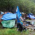 Tents and various items are scattered across the Mill Campground in August of 2022. (Mark Sabbatini / Juneau Empire File)