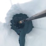 A drill penetrates well below the surface of the Juneau Icefield as researchers study water hundreds of meters beneath earlier this month. (Photo courtesy of Jacob Holmes)